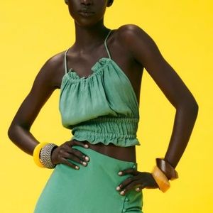 Open back green linen blend top